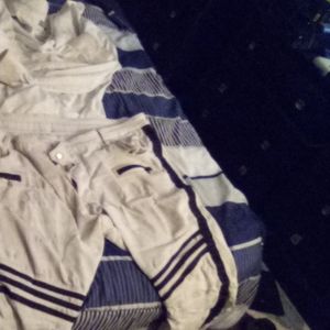 White shirt white black with stripes